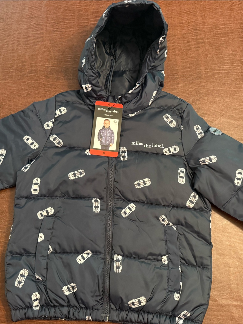 Kids Navy Hooded Puffer Jacket with White Car Print by miles the label